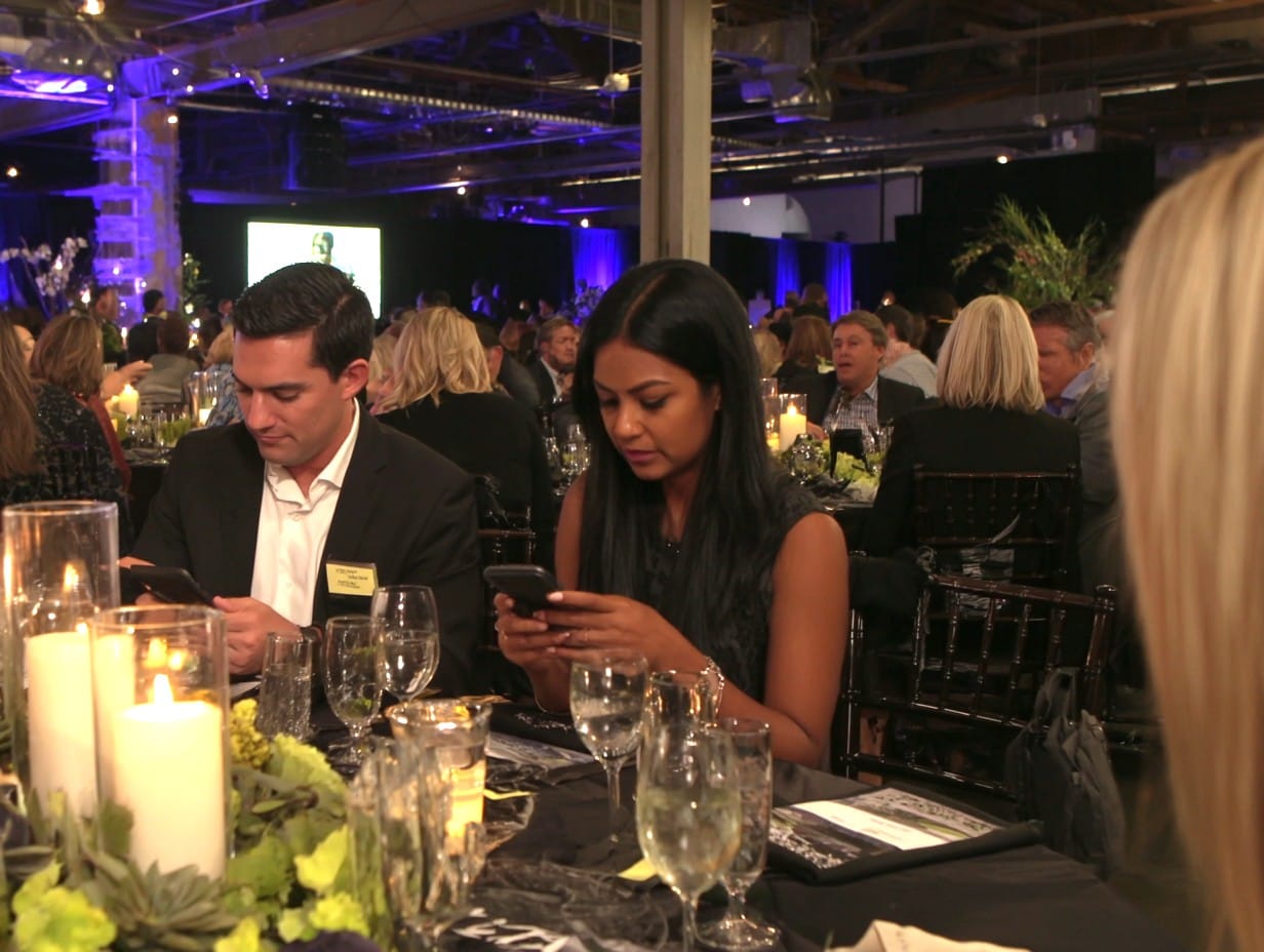 Donors use mobile bidding at hybrid auction